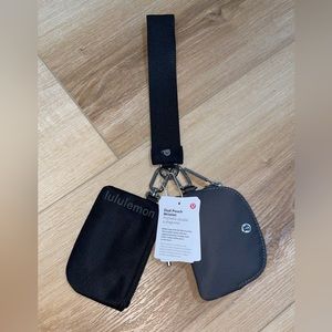 Lululemon dual pouch wristlet black and traverse gray NWT